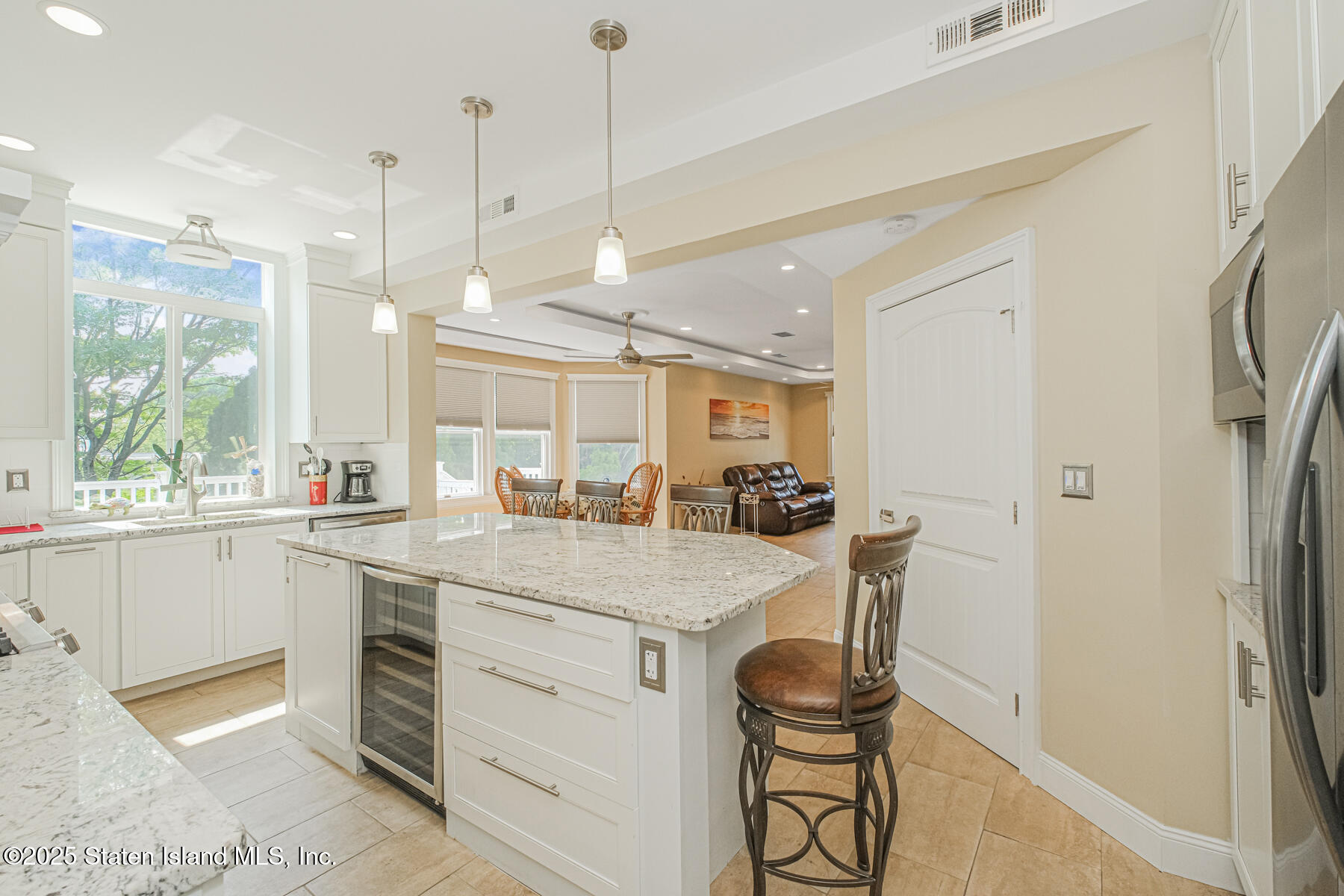 5434 Amboy Road Staten Island, NY 10312 - Photo 19 of 51 a kitchen with a sink a counter space appliances and cabinets