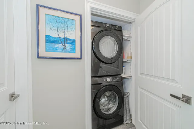 a view of washer and dryer in a utility room