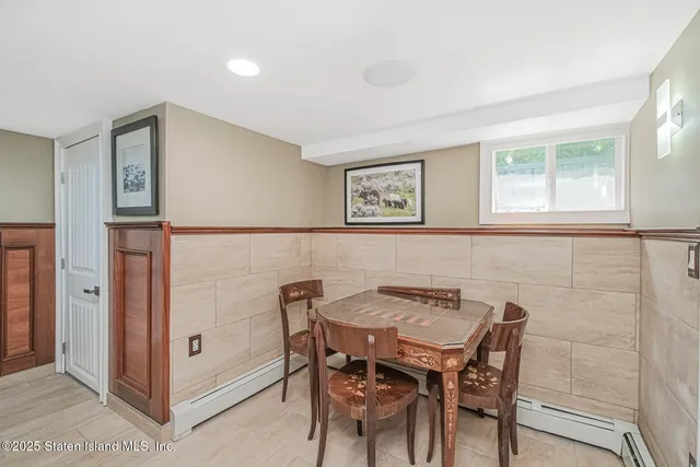 a view of a dining room with furniture