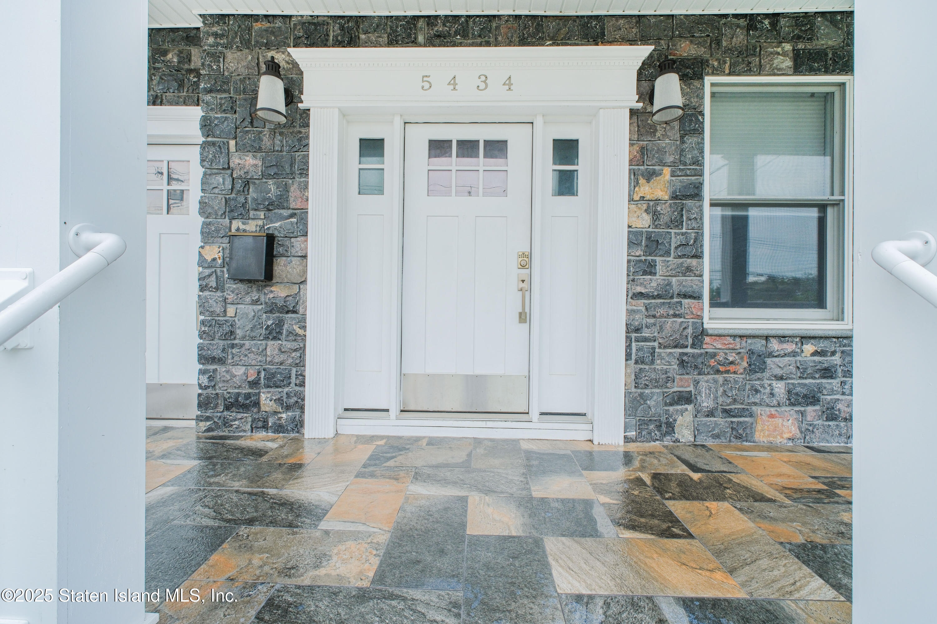 5434 Amboy Road Staten Island, NY 10312 - Photo 4 of 51 a view of front door of house