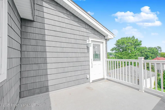 a view of a house with a street