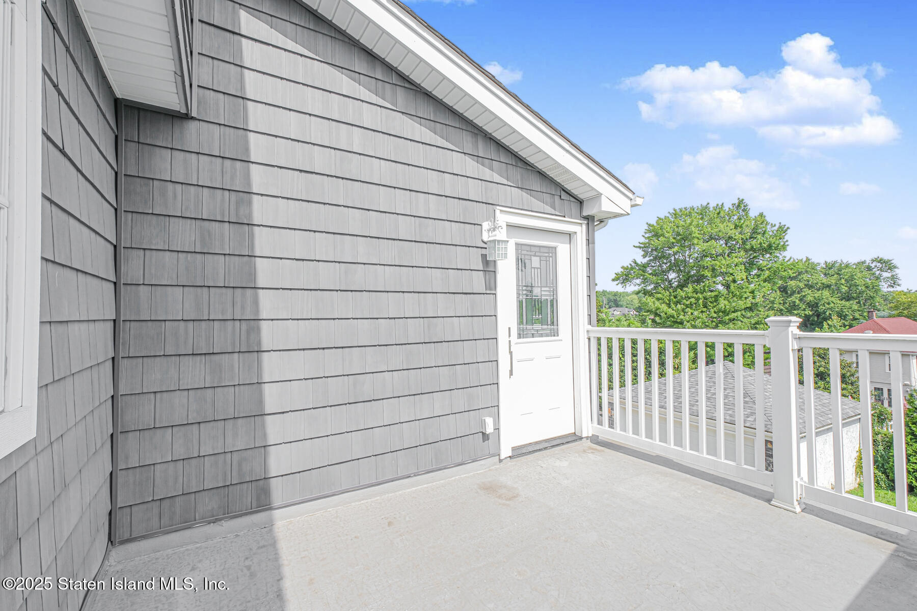 5434 Amboy Road Staten Island, NY 10312 - Photo 7 of 51 a view of a house with a street