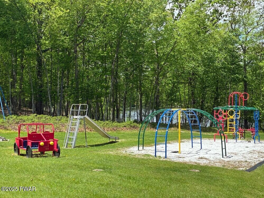 116 Maple Ridge Road Milford, PA 18337 - Photo 50 of 53 a view of a backyard with swimming pool
