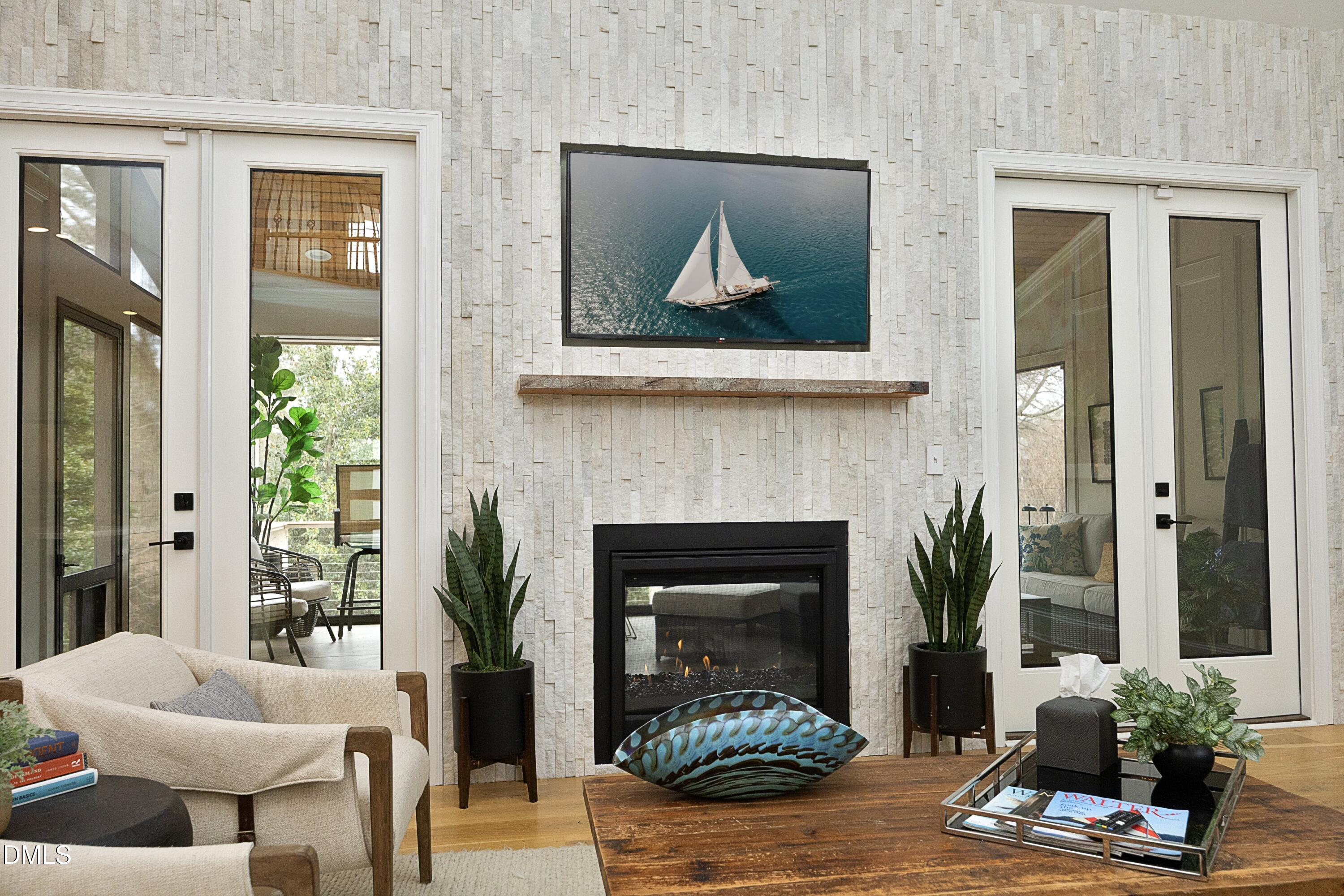 2608 St Marys Street Raleigh, NC 27609 - Photo 18 of 89 a living room with furniture and a fireplace