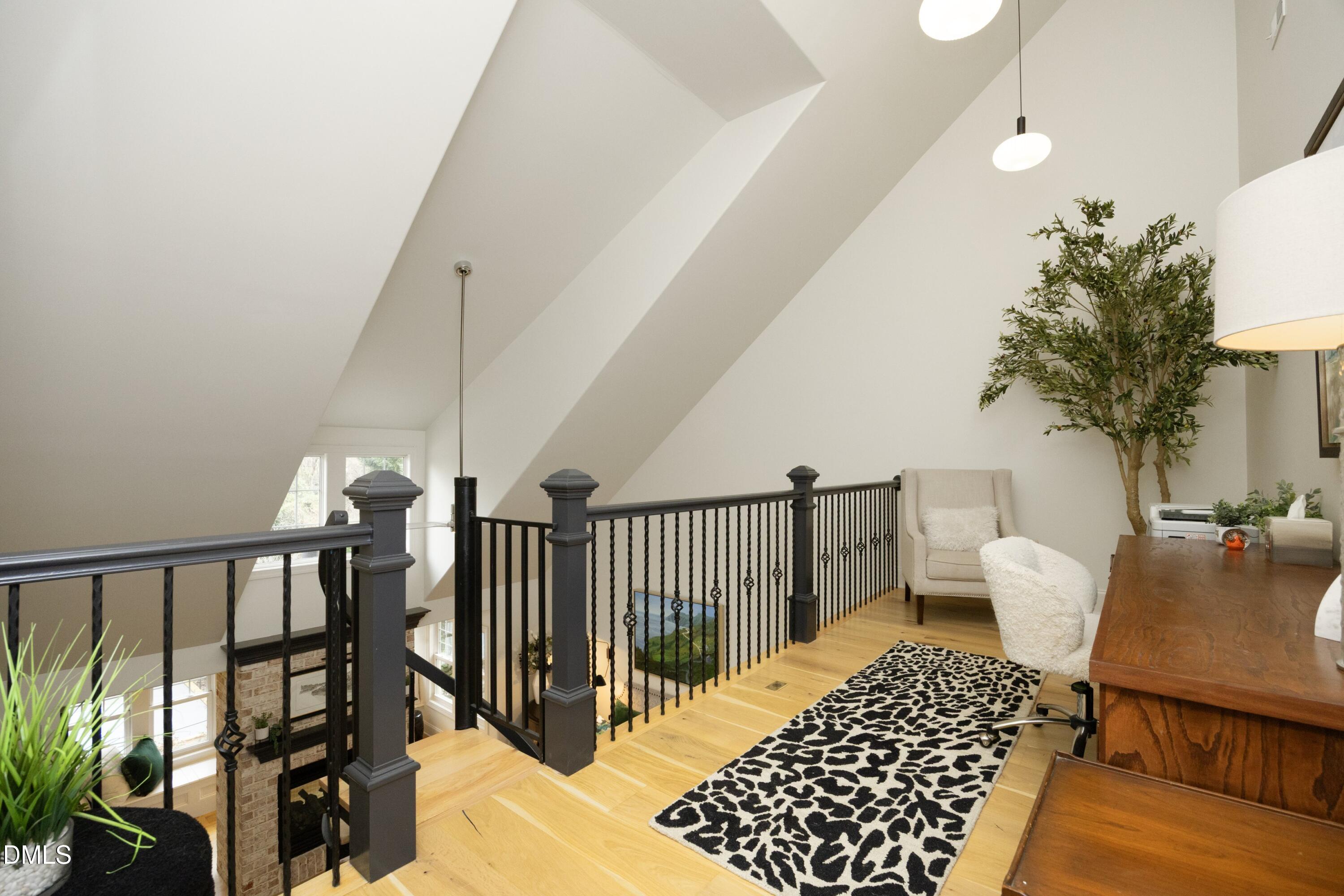 2608 St Marys Street Raleigh, NC 27609 - Photo 31 of 89 a bedroom with furniture and wooden floor