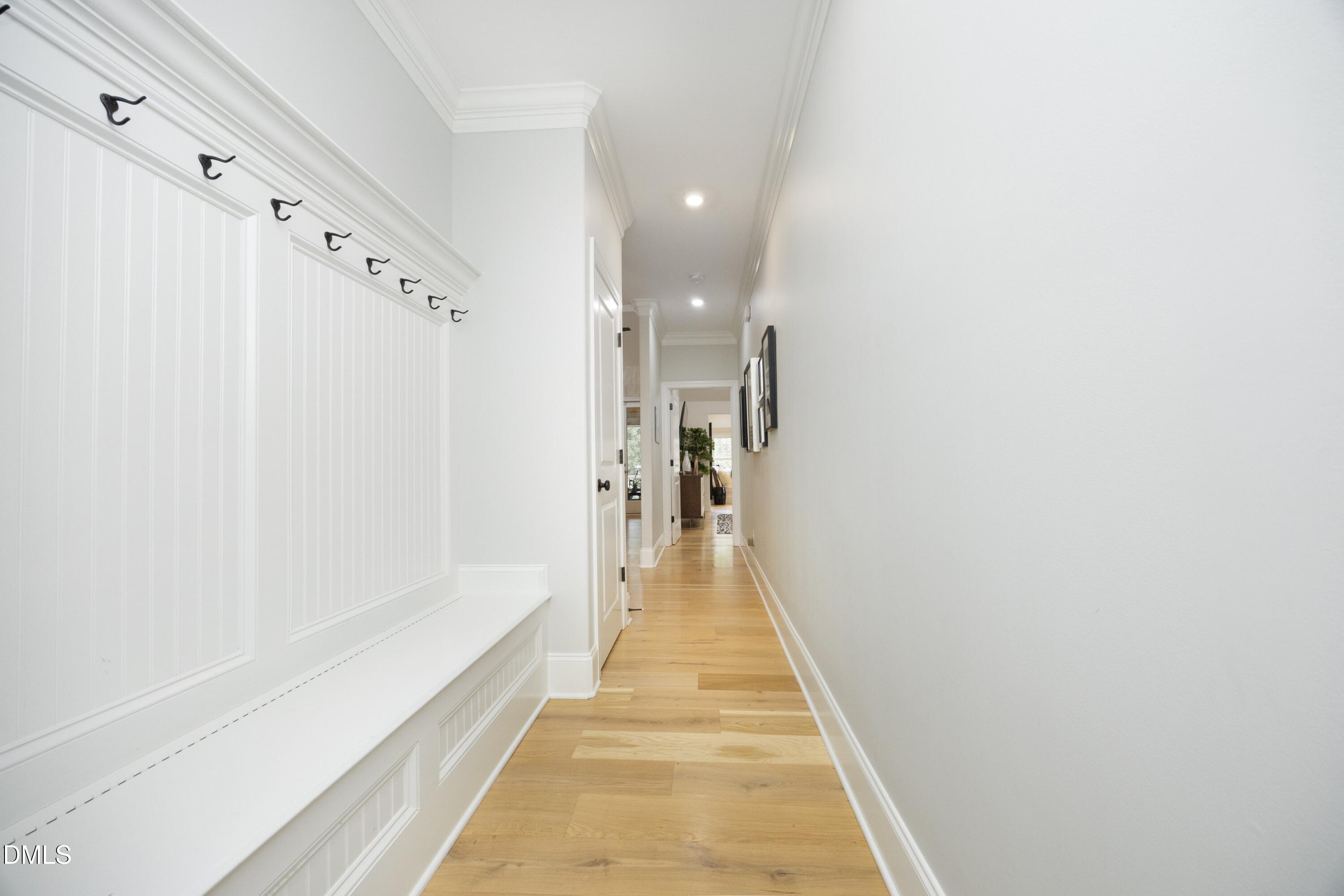 2608 St Marys Street Raleigh, NC 27609 - Photo 36 of 89 a view of a hallway with wooden floor and staircase