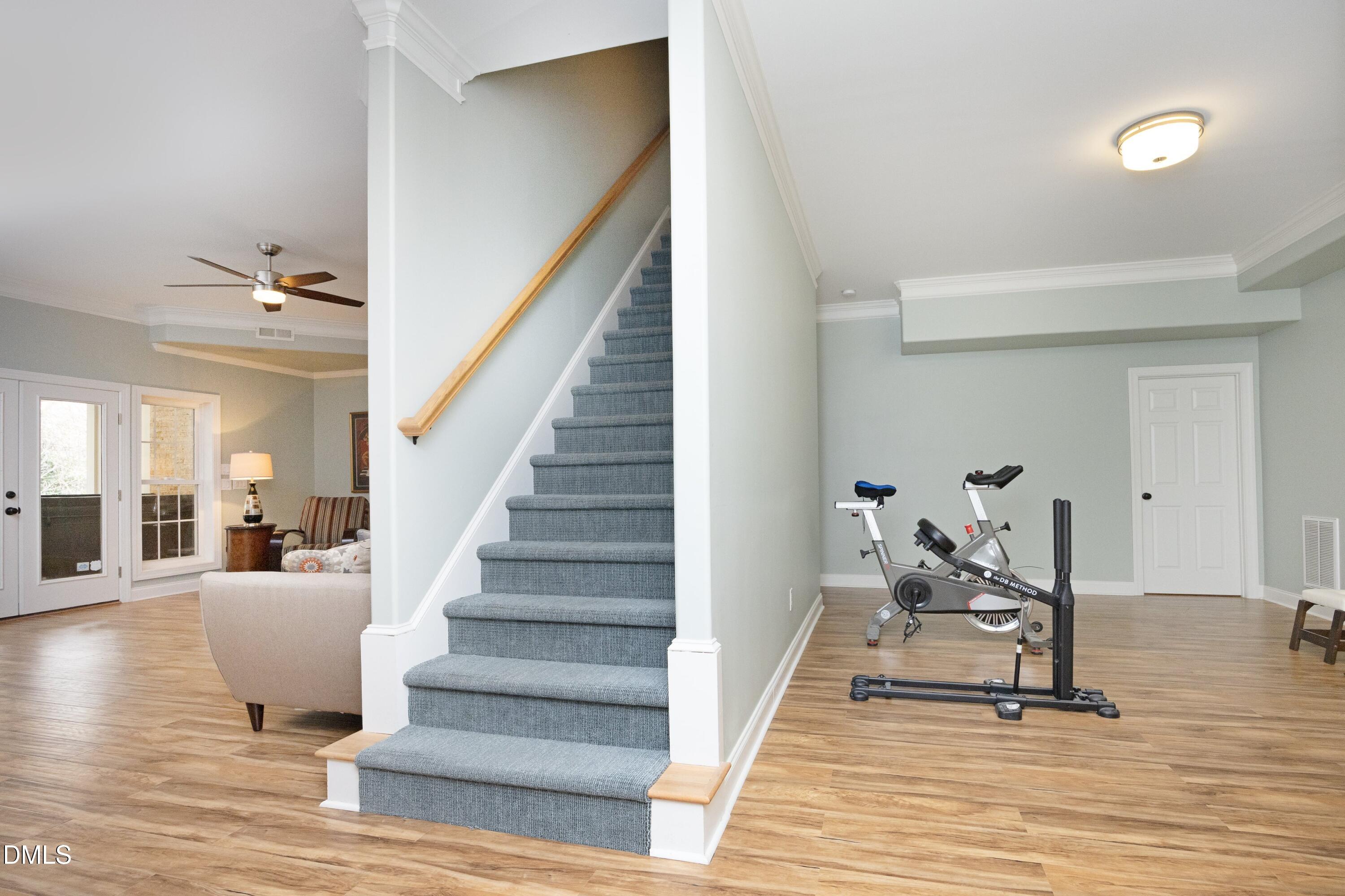 2608 St Marys Street Raleigh, NC 27609 - Photo 48 of 89 a living room with furniture and wooden floor