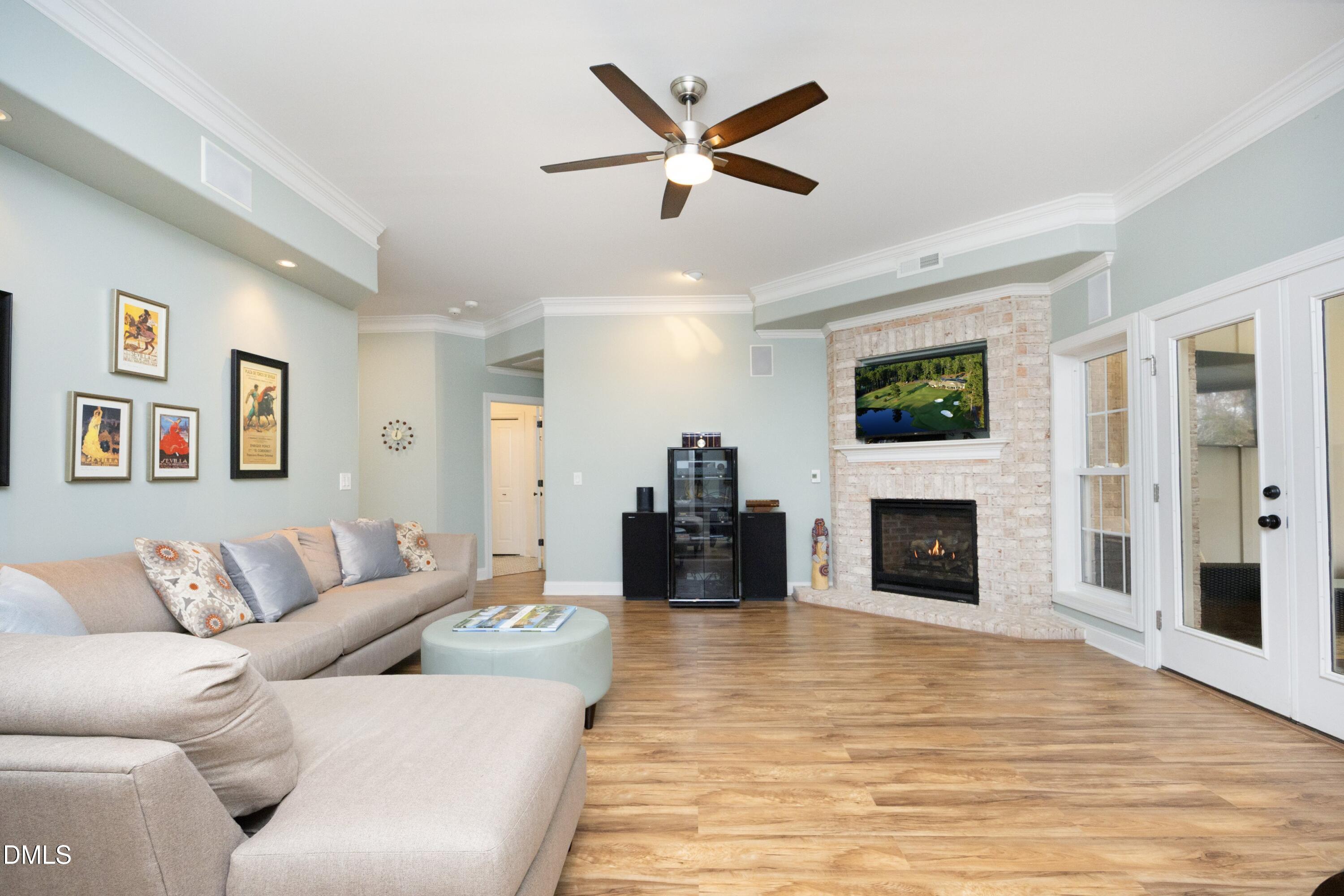 2608 St Marys Street Raleigh, NC 27609 - Photo 50 of 89 a living room with furniture and a fireplace