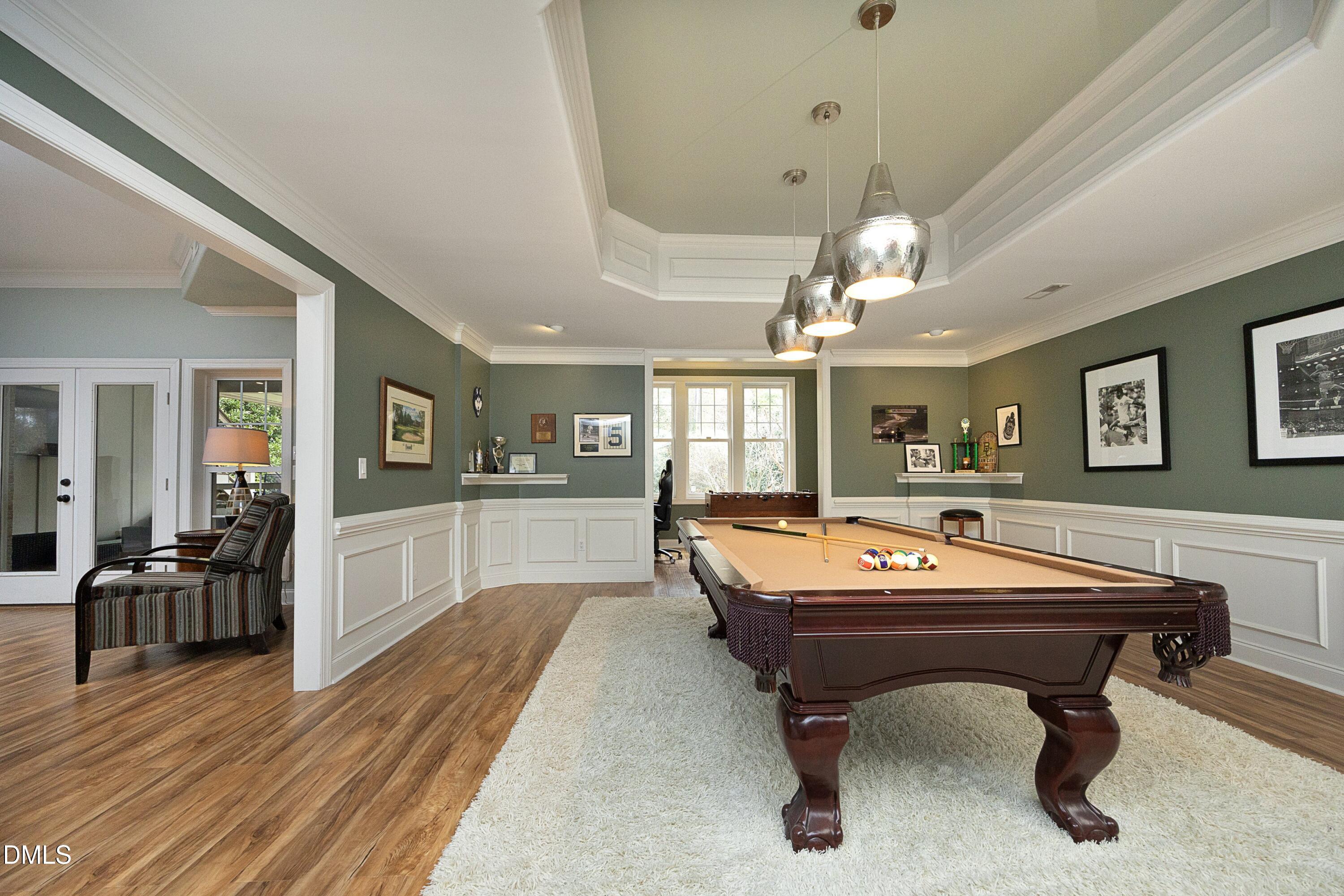 2608 St Marys Street Raleigh, NC 27609 - Photo 52 of 89 a room with pool table and windows