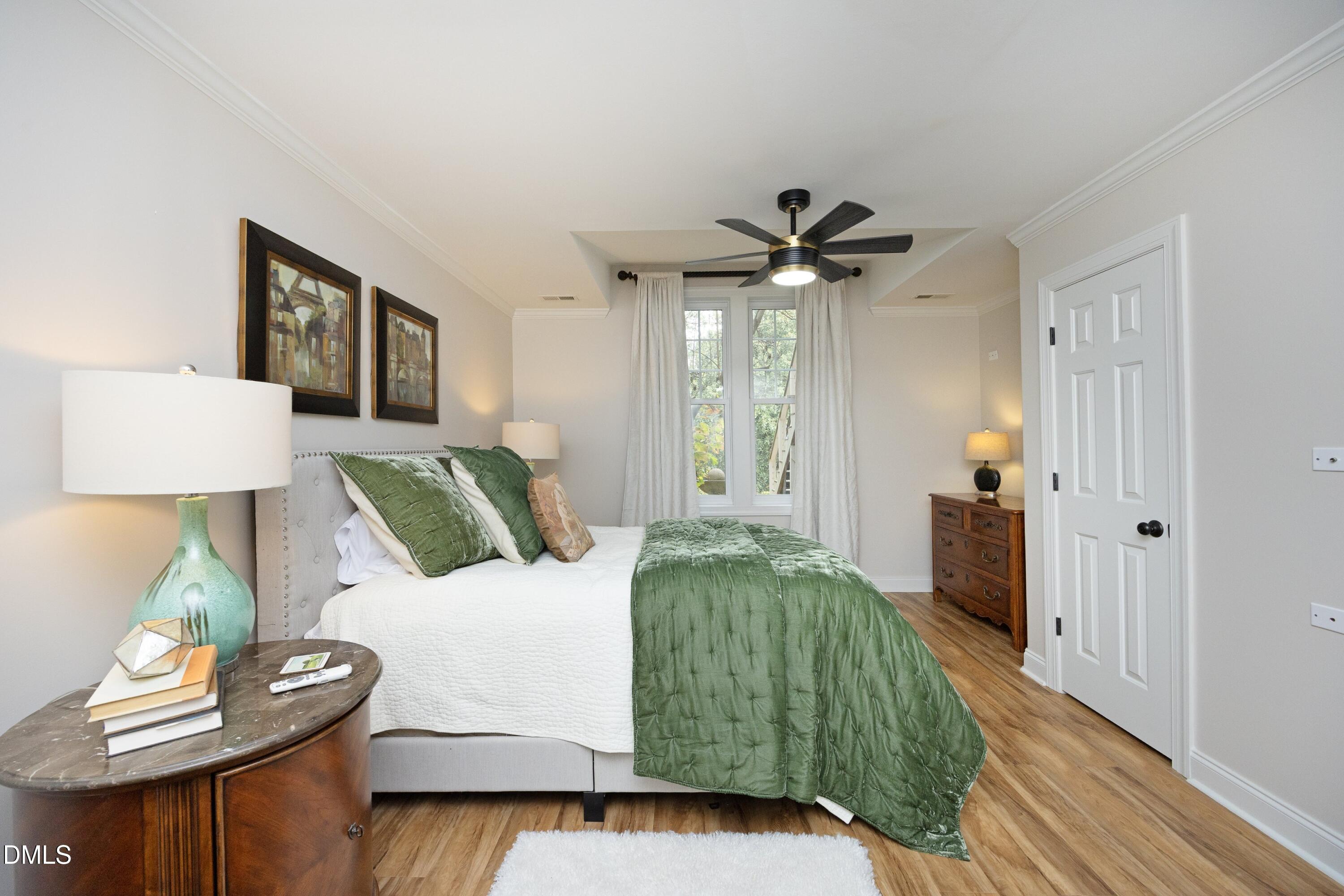 2608 St Marys Street Raleigh, NC 27609 - Photo 54 of 89 a living room with furniture and a wooden floor