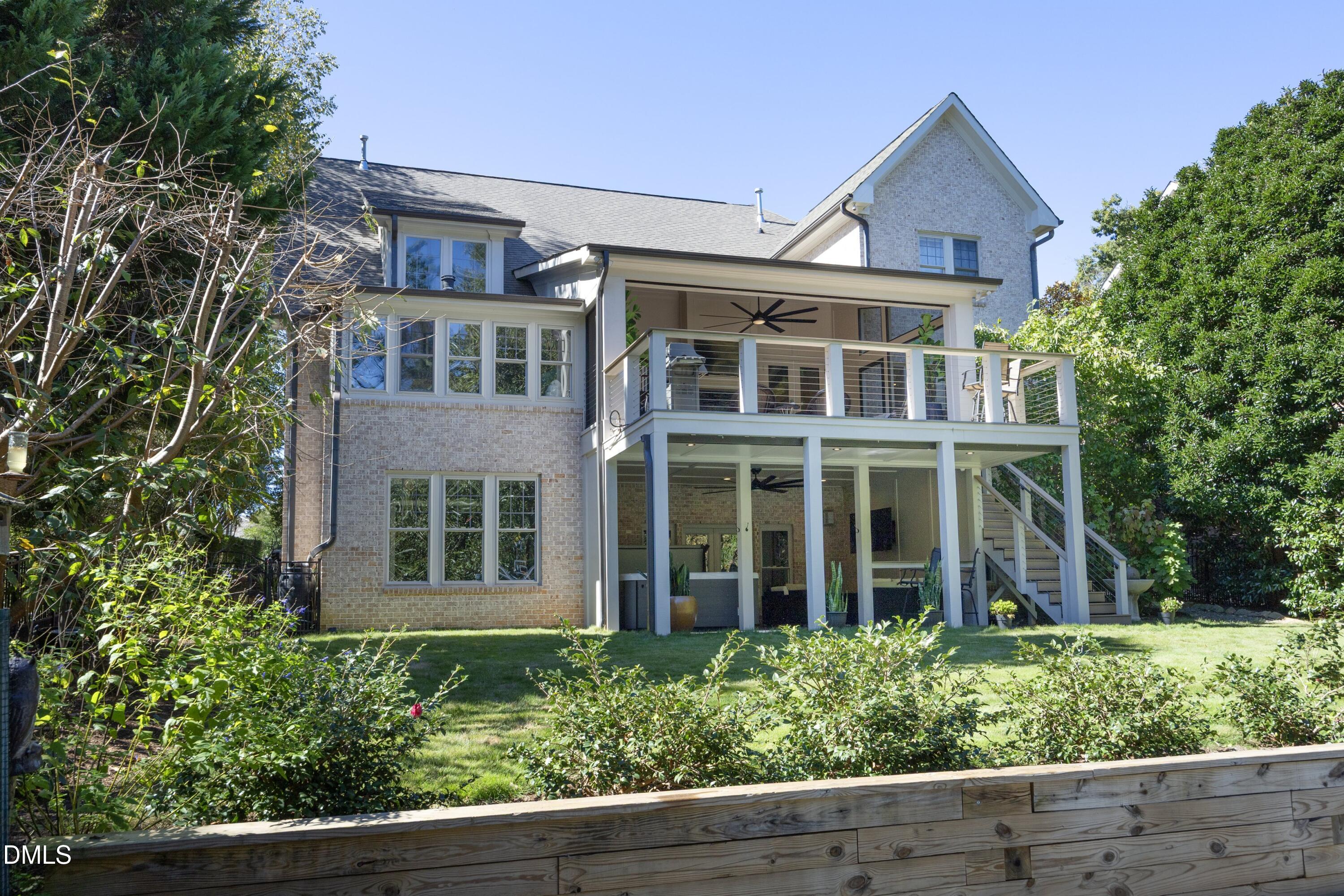 2608 St Marys Street Raleigh, NC 27609 - Photo 81 of 89 front view of a brick house with a large window