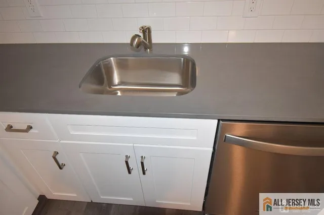 a kitchen with a stove and a microwave