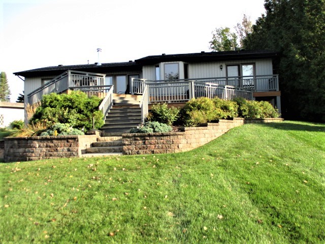527 Baintree Road Lake Summerset, IL 61019 - Photo 1 of 36 a front view of a house with garden