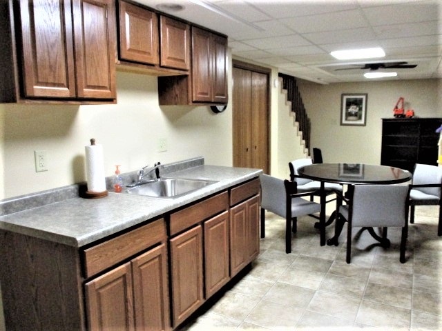 527 Baintree Road Lake Summerset, IL 61019 - Photo 20 of 36 a kitchen with stainless steel appliances granite countertop a sink dishwasher and cabinets with wooden floor