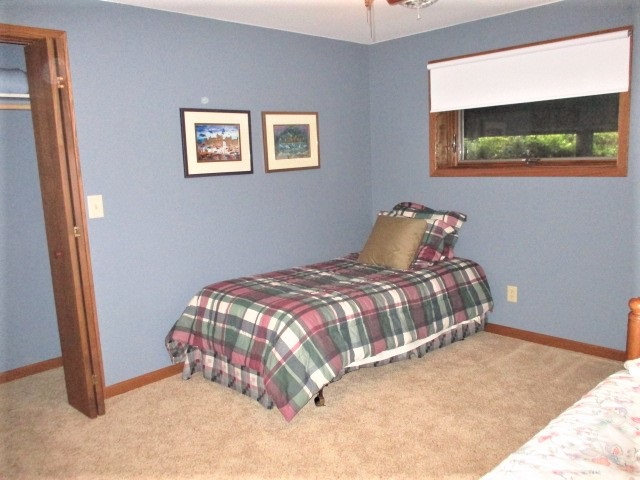 527 Baintree Road Lake Summerset, IL 61019 - Photo 24 of 36 a bedroom with a bed and a window