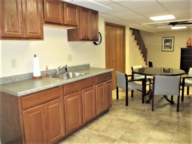 527 Baintree Road Lake Summerset, IL 61019 - Photo 28 of 36 a kitchen with granite countertop sink cabinets and stainless steel appliances