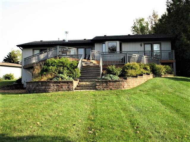 527 Baintree Road Lake Summerset, IL 61019 - Photo 32 of 36 a front view of a house with a yard