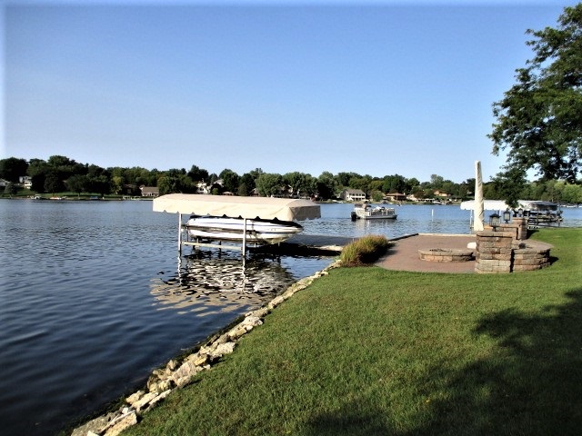 527 Baintree Road Lake Summerset, IL 61019 - Photo 34 of 36 a view of a lake with houses with outdoor space