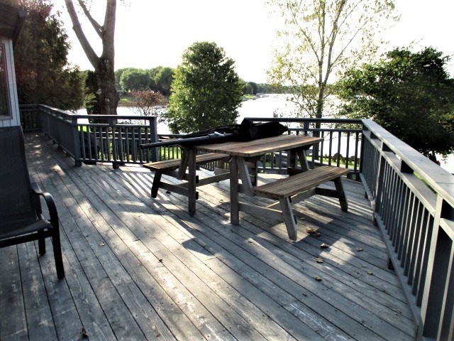 527 Baintree Road Lake Summerset, IL 61019 - Photo 5 of 36 a view of a chairs on wooden deck
