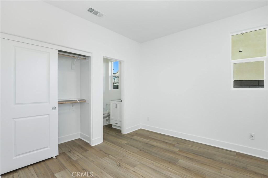 27213 Tamarack Lane Valencia, CA 91381 - Photo 20 of 40 an empty room with wooden floor