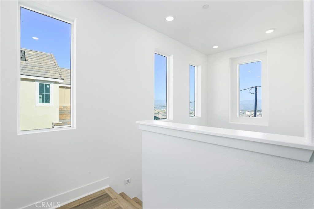 27213 Tamarack Lane Valencia, CA 91381 - Photo 22 of 40 a view of a hallway with window