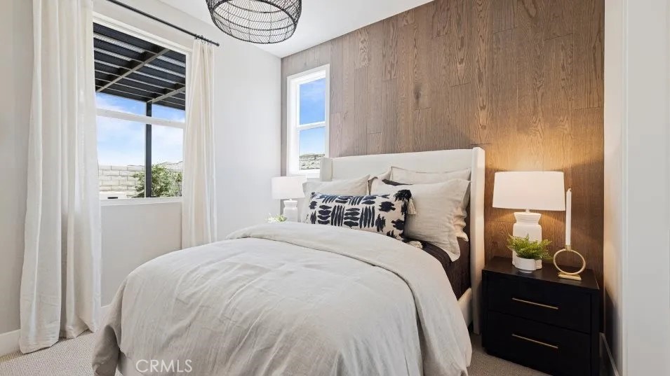 27213 Tamarack Lane Valencia, CA 91381 - Photo 5 of 40 a bed sitting in a bedroom next to a window