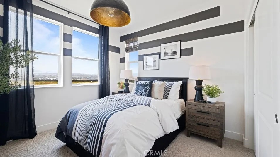 27213 Tamarack Lane Valencia, CA 91381 - Photo 7 of 40 a bedroom with a bed and painting on the wall