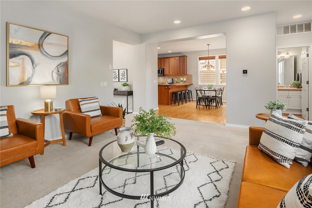17018 166th Place Southeast Renton, WA 98058 - Photo 12 of 34 a living room with furniture and wooden floor