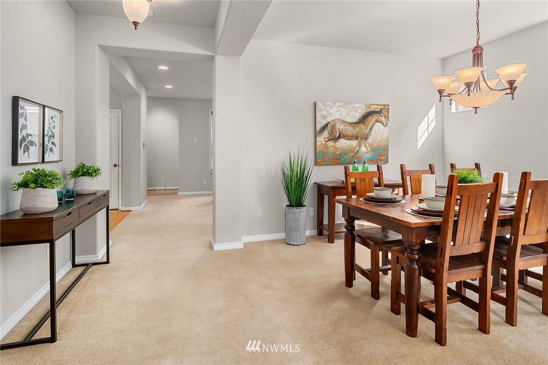 17018 166th Place Southeast Renton, WA 98058 - Photo 14 of 34 a view of a dining room with furniture