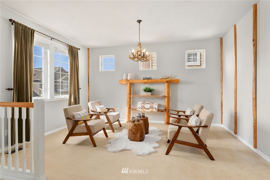 17018 166th Place Southeast Renton, WA 98058 - Photo 20 of 34 a dining room with furniture and window