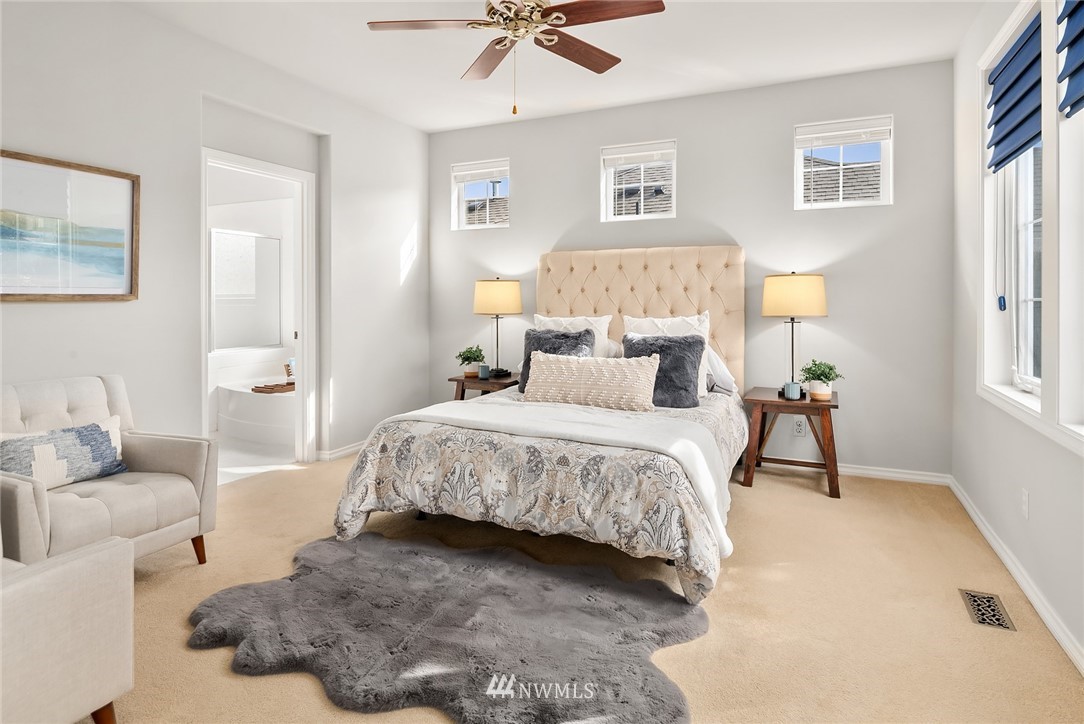 17018 166th Place Southeast Renton, WA 98058 - Photo 21 of 34 a bedroom with a bed and a couch