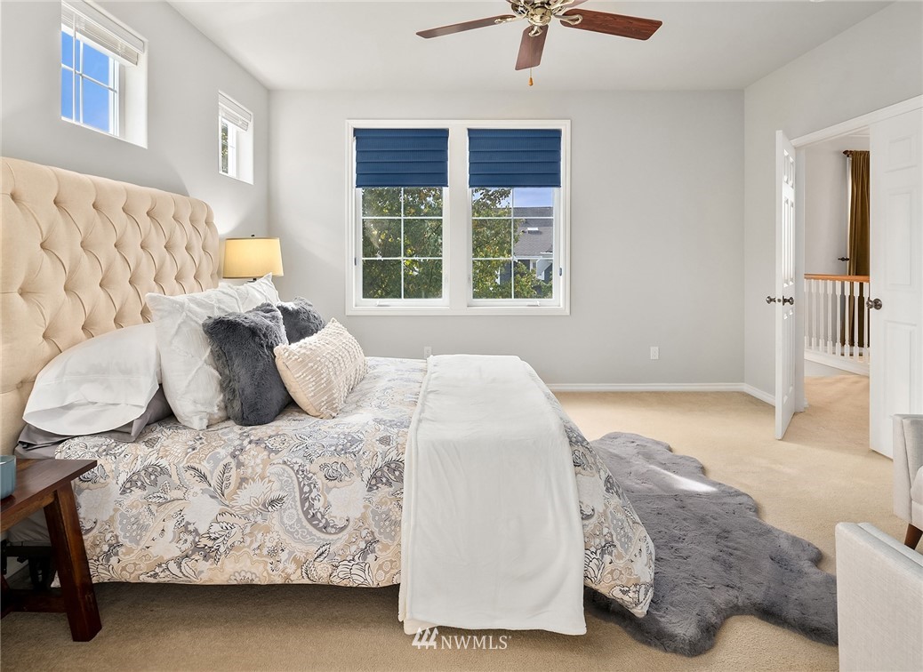 17018 166th Place Southeast Renton, WA 98058 - Photo 22 of 34 a bedroom with a bed and window
