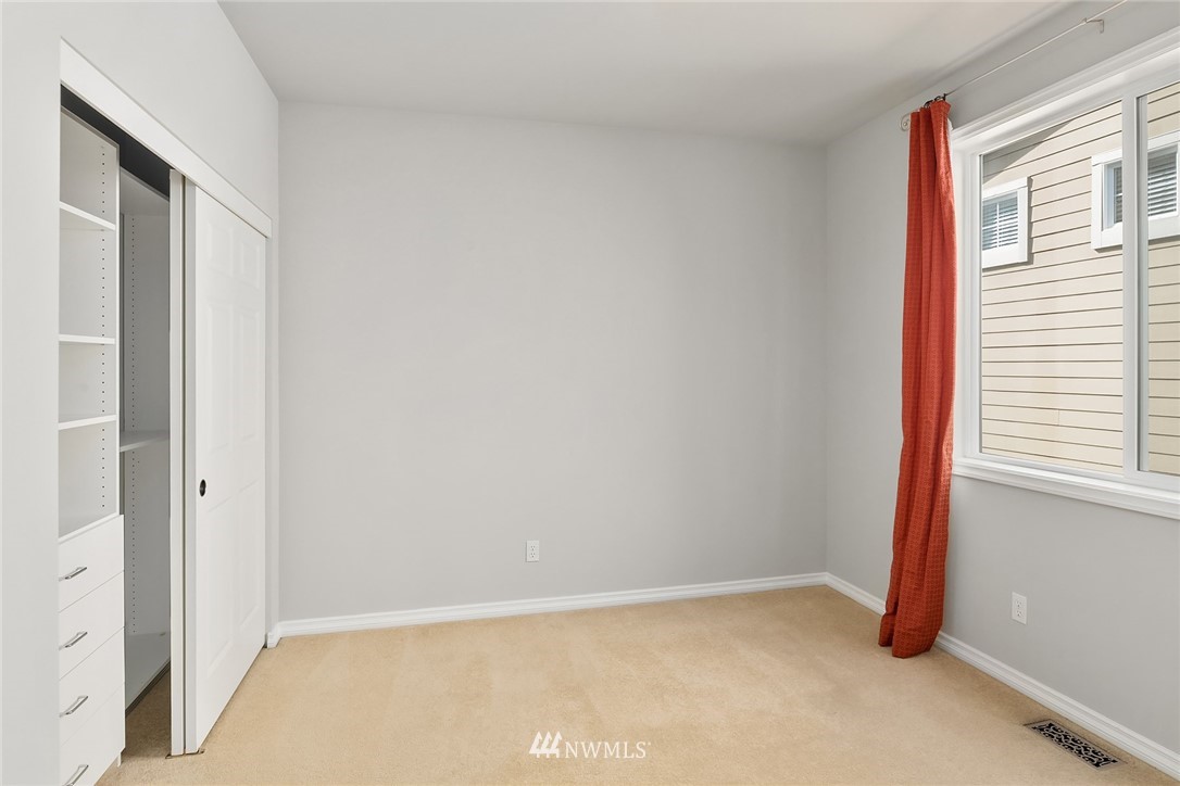17018 166th Place Southeast Renton, WA 98058 - Photo 24 of 34 an empty room with windows