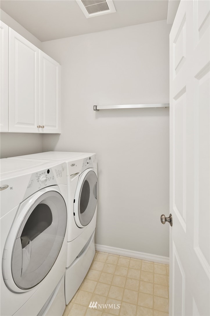 17018 166th Place Southeast Renton, WA 98058 - Photo 27 of 34 a utility room with dryer and washer