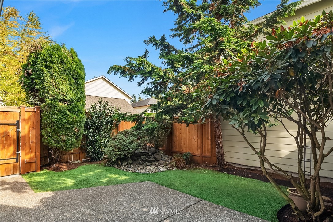 17018 166th Place Southeast Renton, WA 98058 - Photo 28 of 34 a view of a house with a backyard