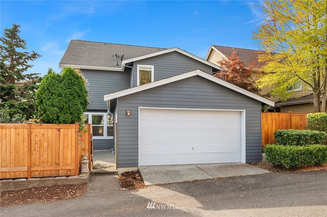 17018 166th Place Southeast Renton, WA 98058 - Photo 30 of 34 a front view of a house with a garage