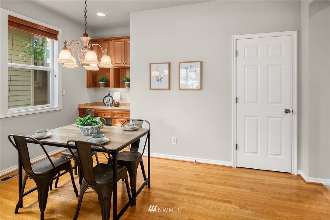 17018 166th Place Southeast Renton, WA 98058 - Photo 8 of 34 a view of a dining room with furniture and window