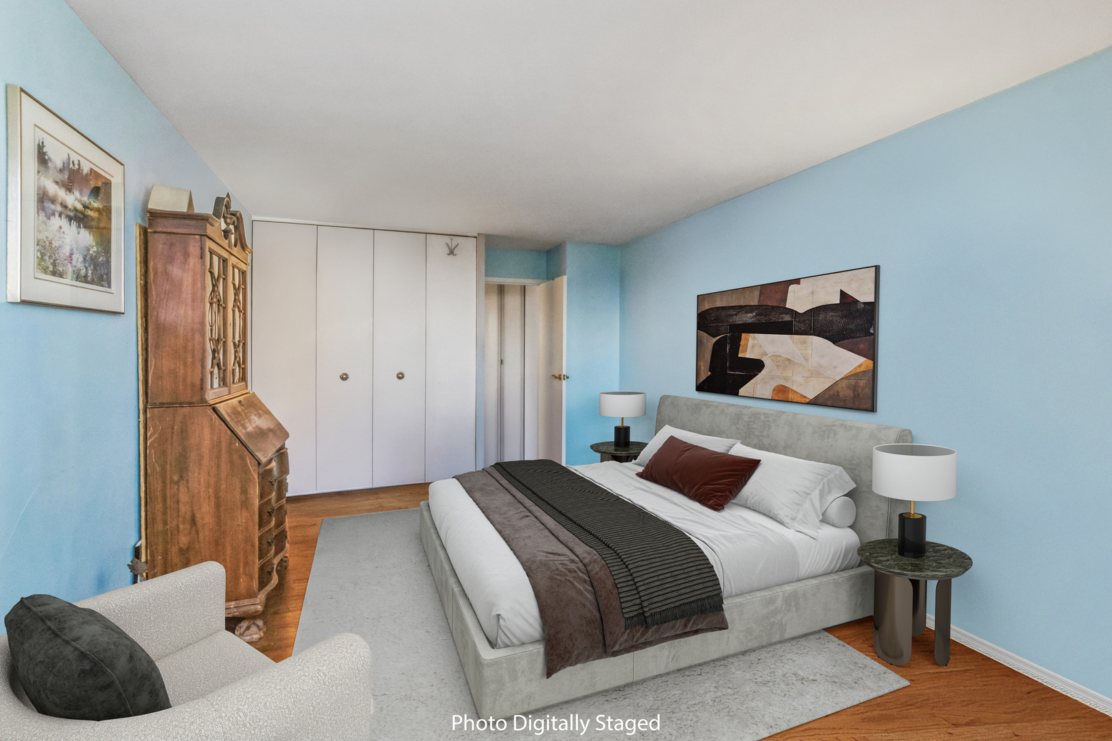 400 East Randolph Street, Unit 1515 Chicago, IL 60601 - Photo 11 of 51 a bedroom with a bed and a painting on the wall