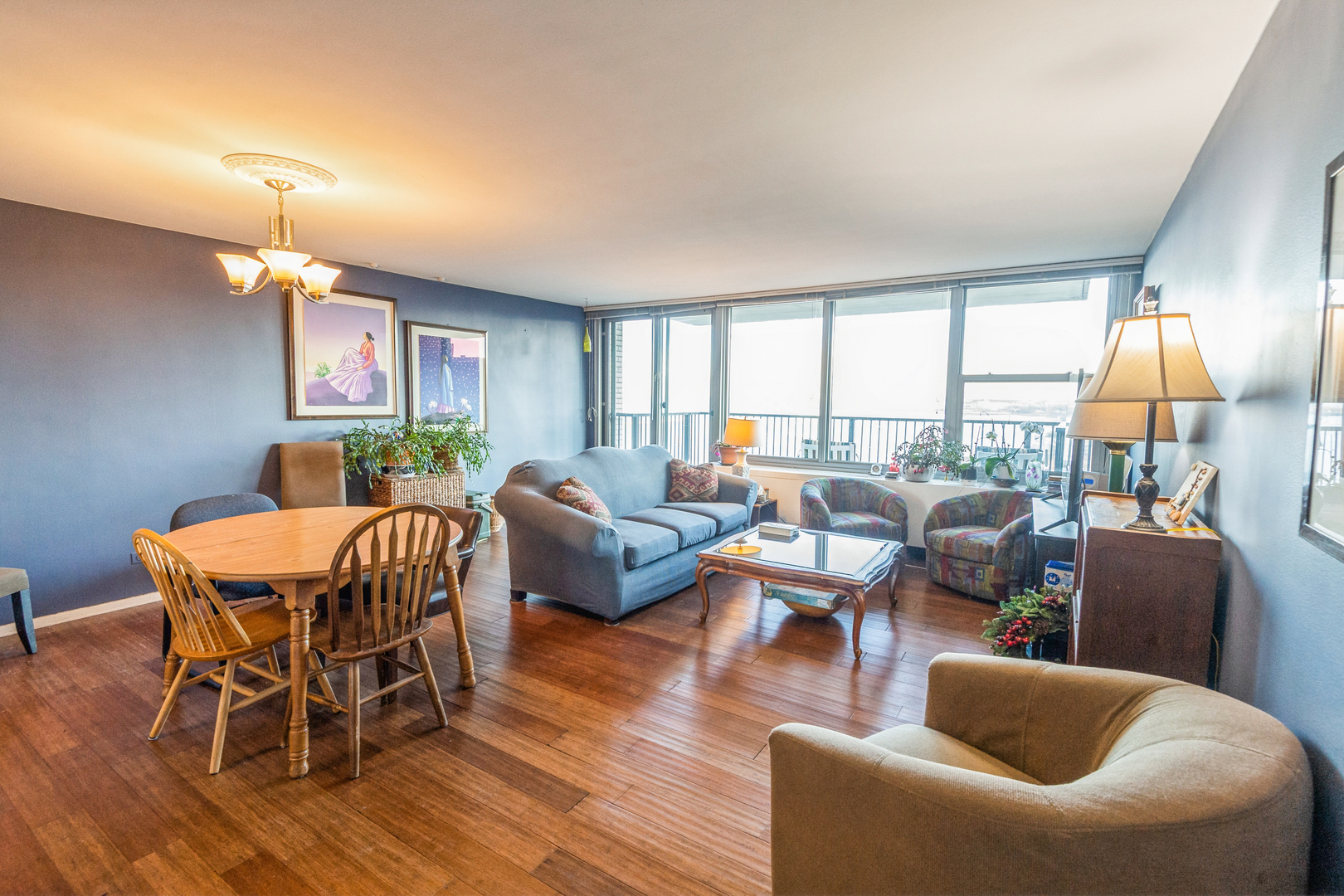 400 East Randolph Street, Unit 1515 Chicago, IL 60601 - Photo 5 of 51 a living room with furniture and a large window