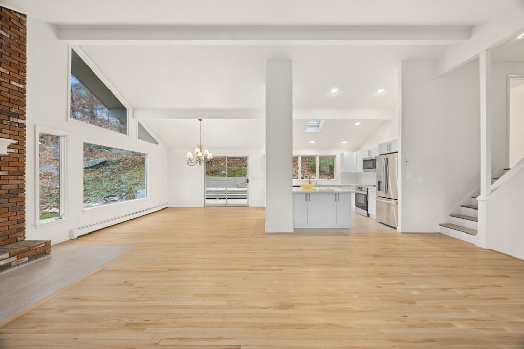 245 Brewer Street Northborough, MA 01532 - Photo 13 of 38 a view of an empty room with a window