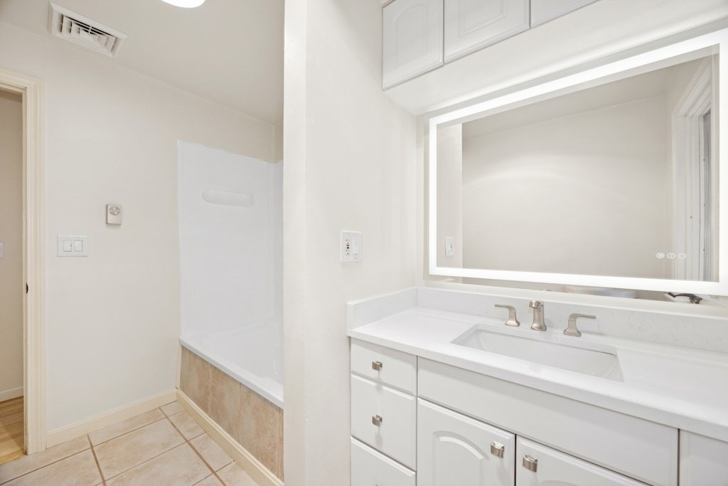 245 Brewer Street Northborough, MA 01532 - Photo 18 of 38 a bathroom with a sink and a mirror