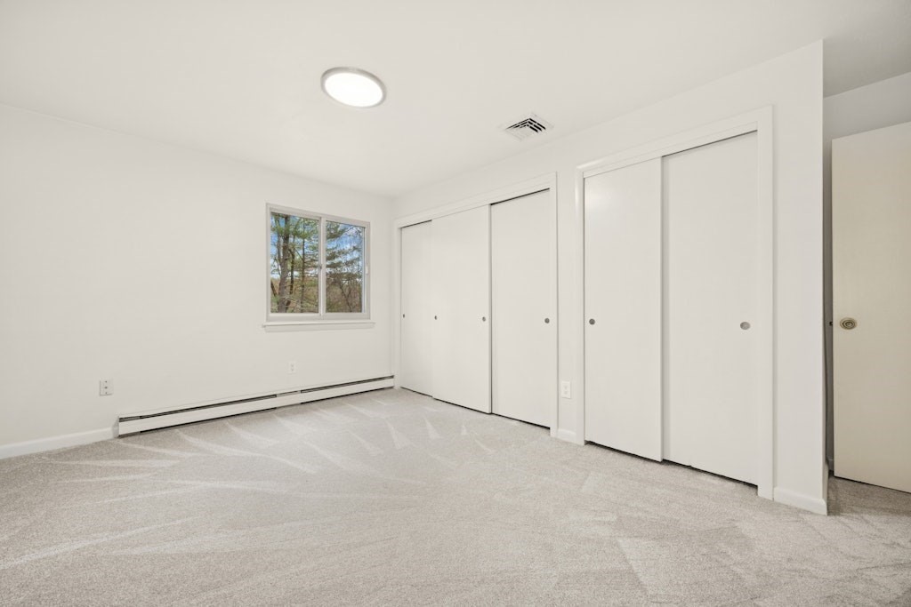 245 Brewer Street Northborough, MA 01532 - Photo 20 of 38 a view of an empty room with a window