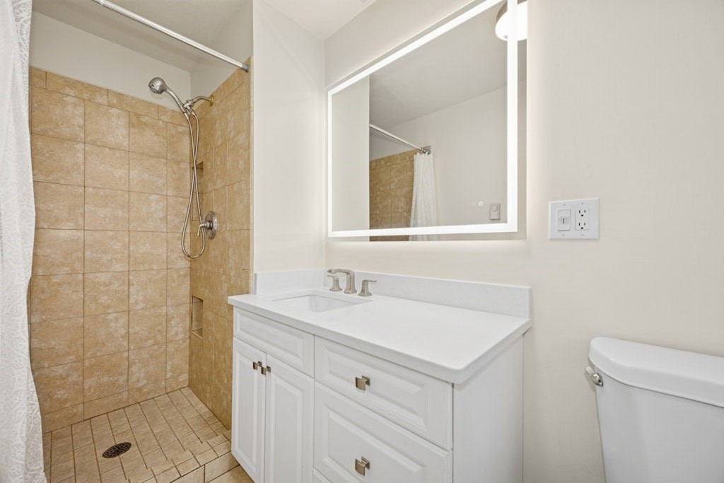 245 Brewer Street Northborough, MA 01532 - Photo 23 of 38 a bathroom with a sink a toilet and shower