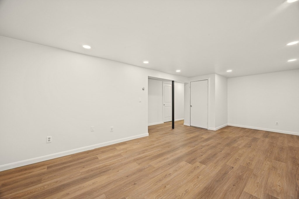 245 Brewer Street Northborough, MA 01532 - Photo 30 of 38 a view of an empty room with wooden floor