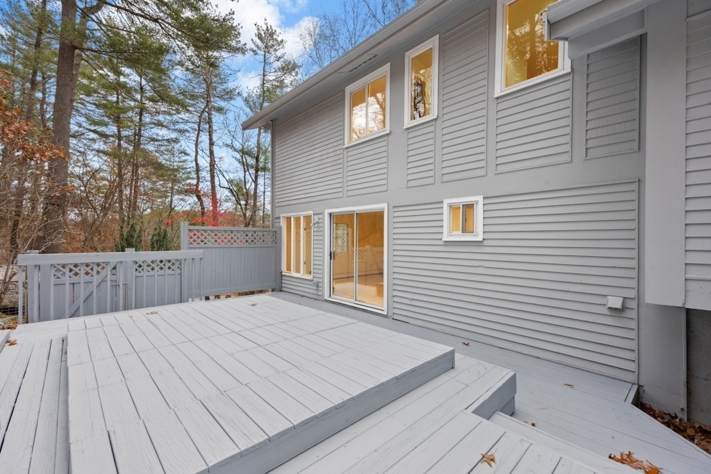 245 Brewer Street Northborough, MA 01532 - Photo 32 of 38 a view of backyard with a deck