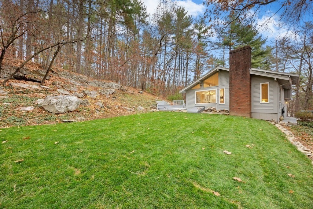 245 Brewer Street Northborough, MA 01532 - Photo 35 of 38 a view of a house with yard and sitting area