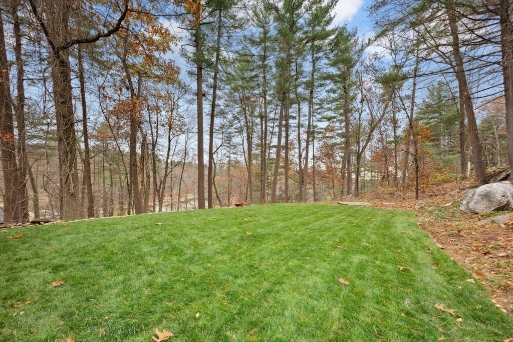 245 Brewer Street Northborough, MA 01532 - Photo 36 of 38 a view of a yard with large trees