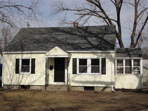 21 Anne Street Springfield, MA 01104 - Photo 2 of 27 a house view with a garden space