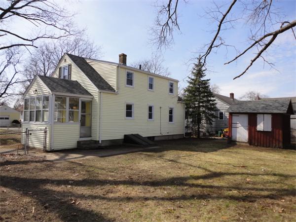 21 Anne Street Springfield, MA 01104 - Photo 6 of 27 a view of a house with a yard