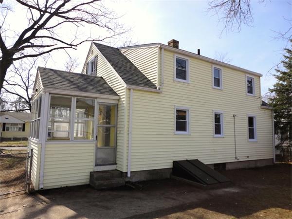 21 Anne Street Springfield, MA 01104 - Photo 7 of 27 a view of a house with a yard